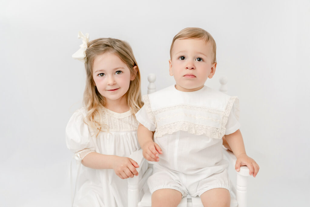Two young siblings posed together for a timeless heirloom session in the Atlanta area