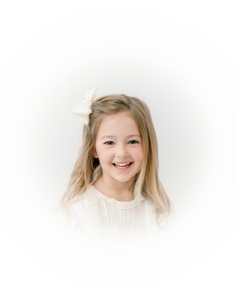 Sweet smiling portrait of a little girl during an Atlanta heirloom photography session