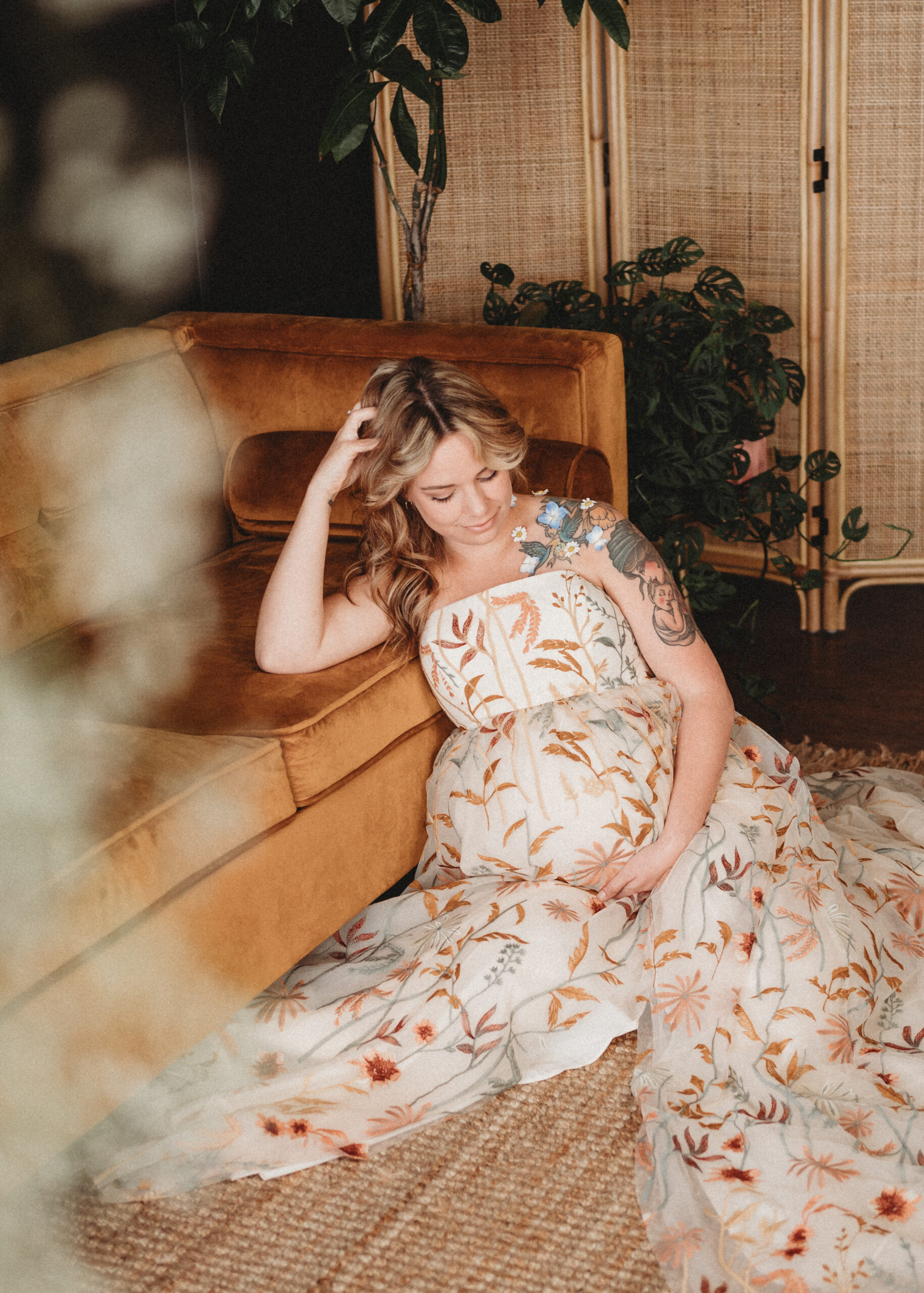 Mother looks lovingly at baby bump in Dahlonega Maternity Session