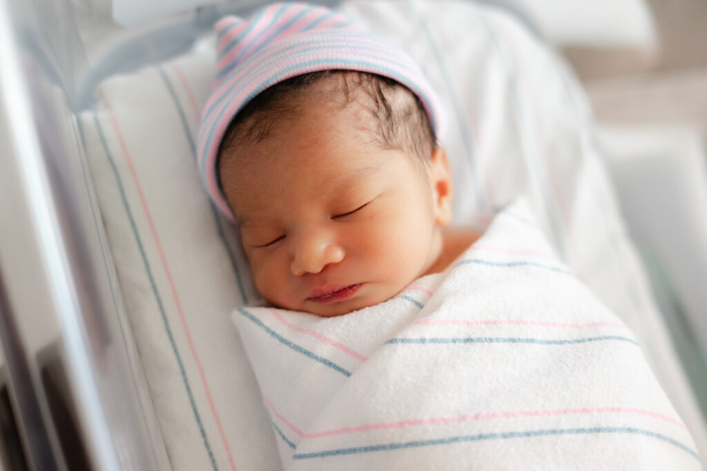 Baby boy in bassinet in Atlanta hospital newborn session